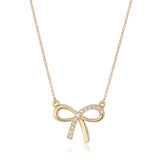 Bow Pendant Necklace in 14K Yellow or White Gold with CZ